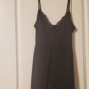 Charlotte Russe XL Black Romper with a sheer train. Has a great deal of stretch.